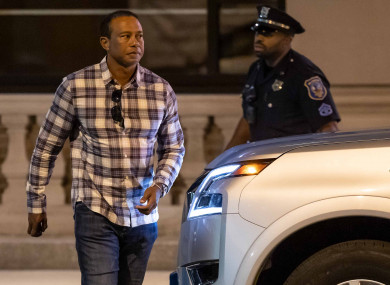 Tiger Woods leaves the hotel duPont after a meeting with PGA players on Tuesday.