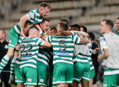 The Hoops players celebrating last night.