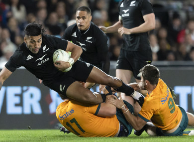 New Zealand's Rieko Ioane is tackled by Australia's Angus Bell and Jake Gordon, right, during the Bledisloe Cup rugby test match between the All Blacks and the Wallabies.