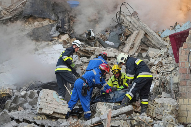 At least 14 people, including three children, killed in overnight Russian strikes in Kyiv