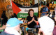 Irish flotilla activists deported from Israel land at Dublin Airport to hundreds of supporters