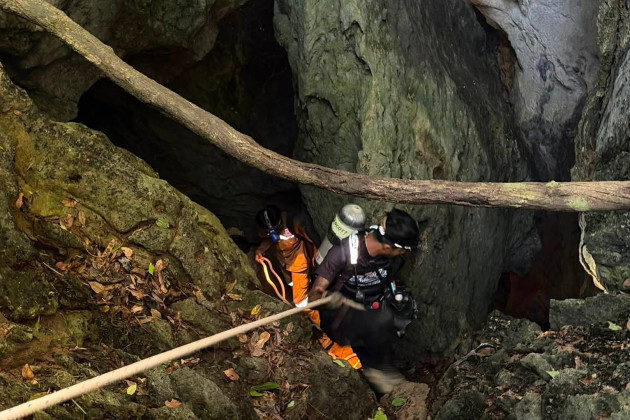 Heavy rains threaten to delay search for last two missing people in flooded Laos cave
