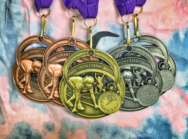 Raising them right: Sport participation medals used to drive me mad until I became a parent