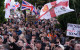 Police in the UK pelted with projectiles at rally over college student's murder