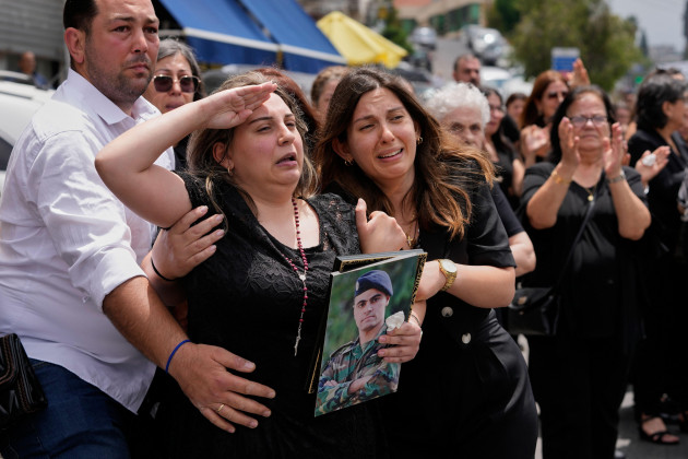 Israel vows to continue attacks in Lebanon despite Iran warning 'crushing measures' would follow