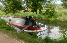 Waterways Ireland working to recover partially-sunk houseboat in Dublin's Grand Canal