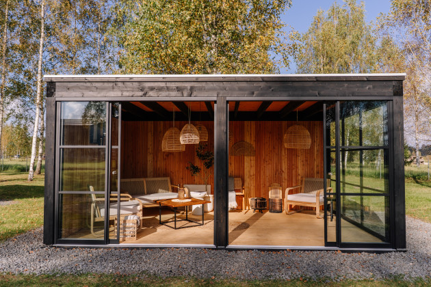 What would it cost to convert my patio into an outdoor 'room'?