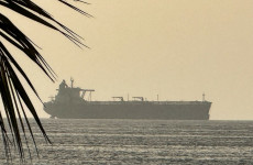 Oil tanker hit by 'unknown projectile' in Strait of Hormuz region
