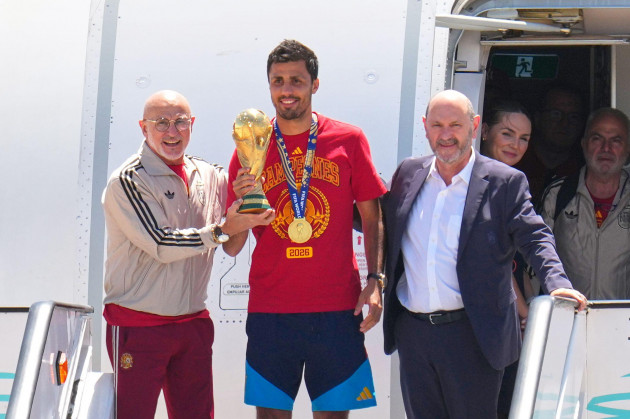 Spain’s World Cup champions return home ahead of open-top bus parade through Madrid