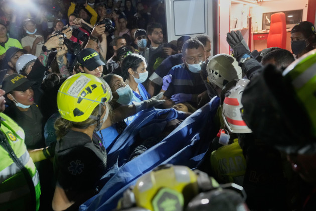 Woman pulled from rubble by Colombian rescuers two days after deadly earthquake Authorities revised the death toll down to 216 after local officials in Cali corrected earlier figures.